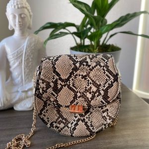 Mango snake skin sling fashion bag.